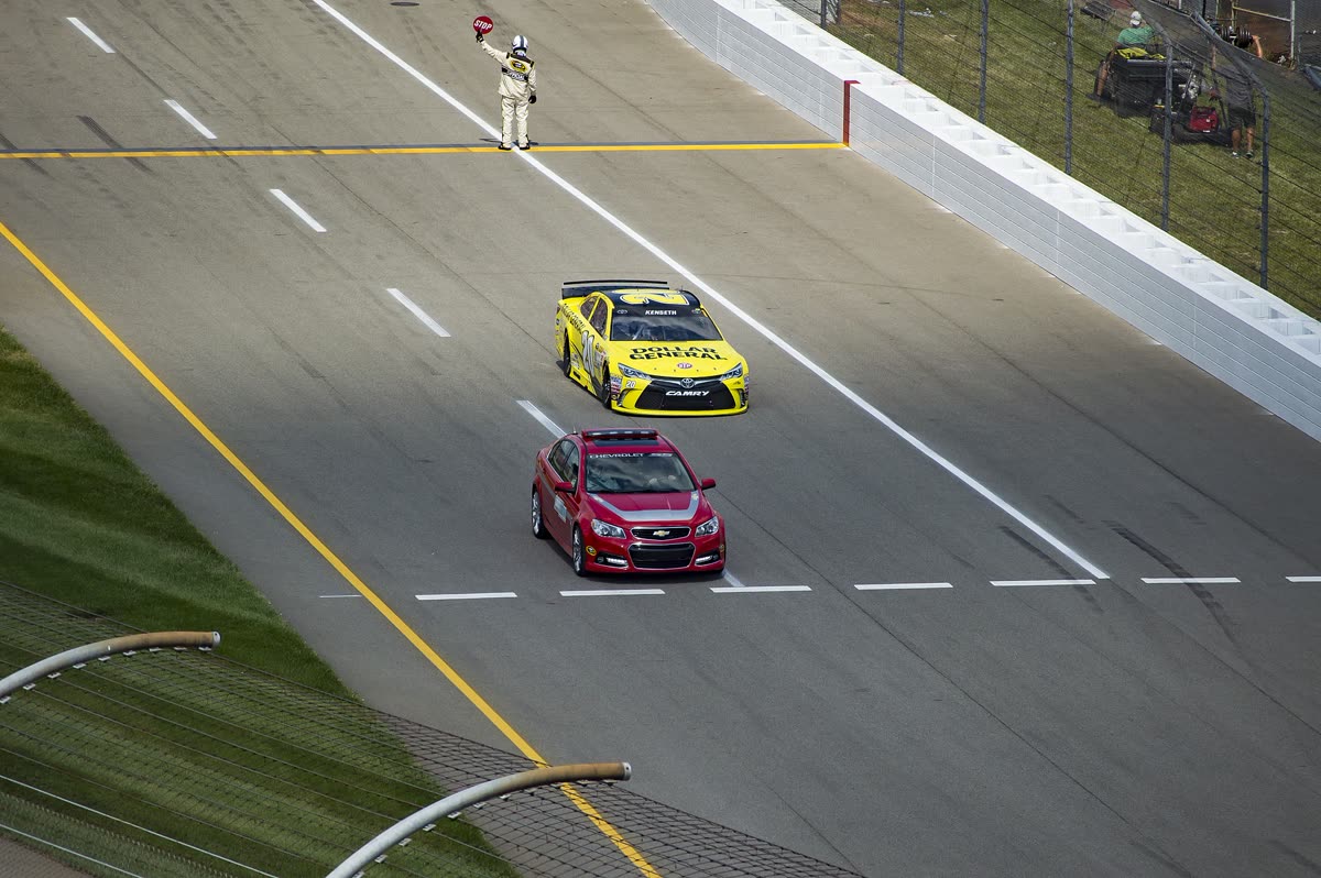 NASCAR Cup cars racing at Michigan International Speedway, 2015