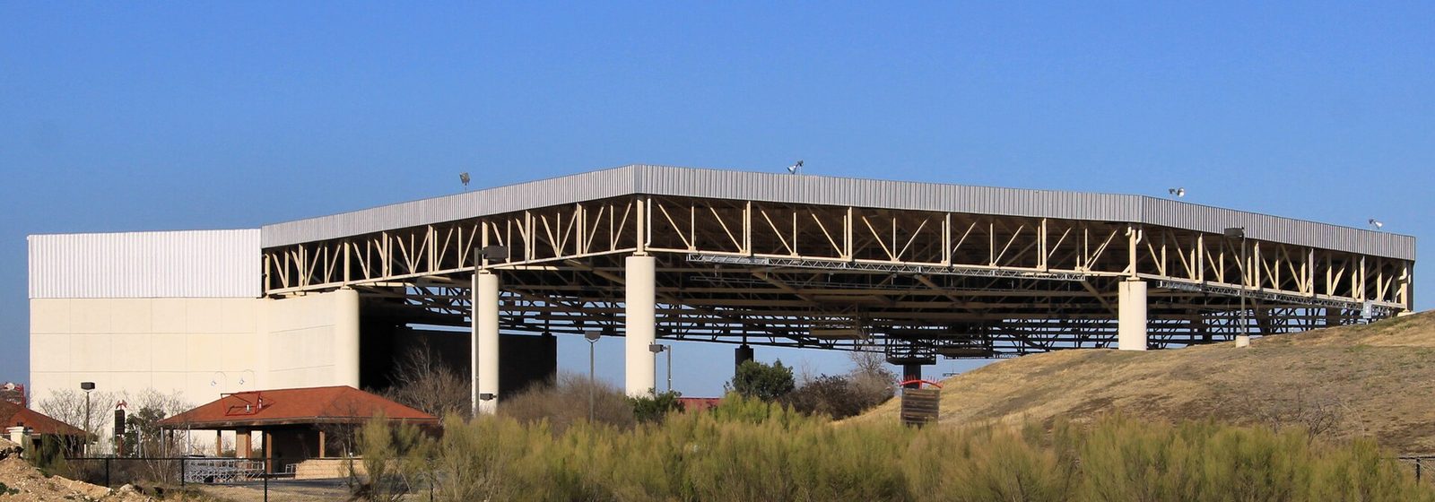 Exterior view of the open-sided canopy roof structure of Real Life Amphitheater, formerly Verizon Wireless Amphitheater, in Selma, Texas - Real Life Ampitheater tickets